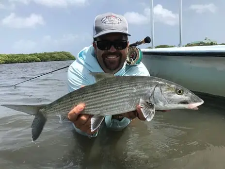 Beautiful Bonefish caught on fly rod in the flats, Roatan fly fishing charter, private boat charter, Caribbean adventure, Dos Reyes Roatan