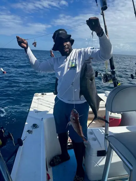 Amberjacks and Snappers caught while bottom fishing in Roatan, private boat charter, Caribbean fishing adventure, Dos Reyes Roatan