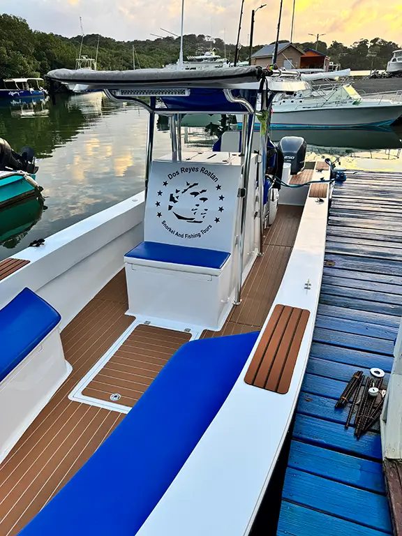 Dos Reyes Roatan Charter boat with 2024 safety equipment — fully equipped private vessel for secure Caribbean snorkeling, fishing, and island tours